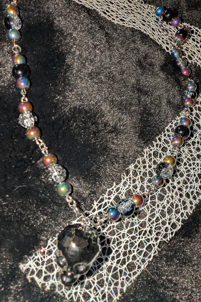 Iridescent Abyss // Faceted Glass Skull Necklace